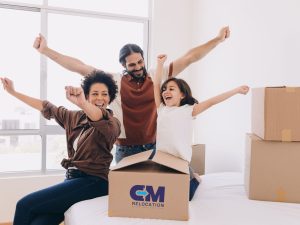 Moving boxes and a family.